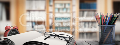 Composite image of school supplies on desk