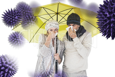 Composite image of couple sneezing in tissue while standing unde