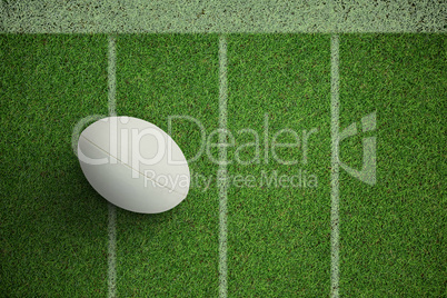 Composite image of close-up of rugby ball