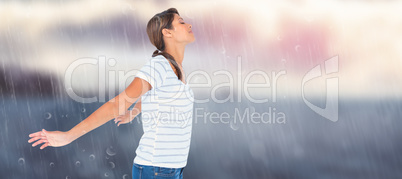Composite image of side view of relaxed woman with arms outstret