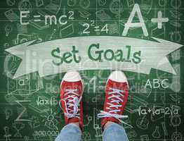 Set goals against green chalkboard