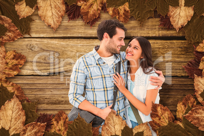 Composite image of attractive young couple going on their holida