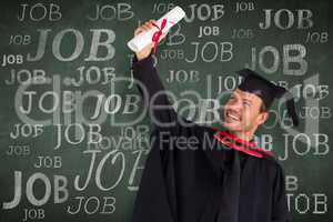 Composite image of happy attractive boy celebrating his graduati