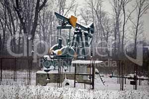Oil wells at snow