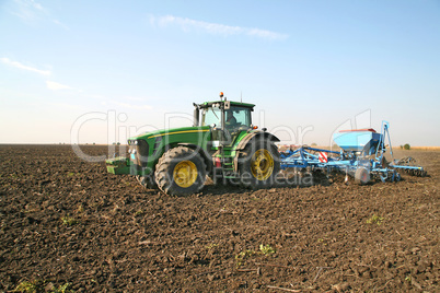 Tractor with seeder