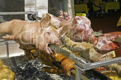 Pig and lamb on the spit