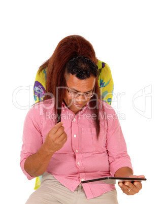 Couple looking at there tablet computer.