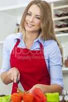 Woman Preparing Vegetables Salad Food in Kitchen