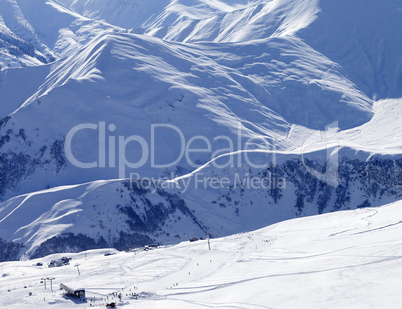 Top view on ski slope at sun day