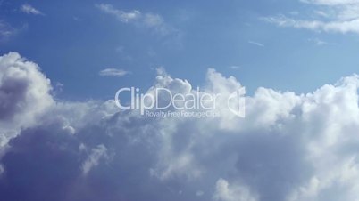 Clouds on hot blue sky, time lapse