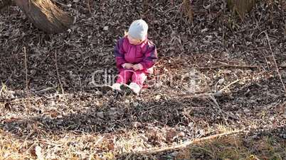 Adorable little girl in the nature in winter