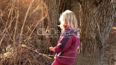 Adorable little girl in the nature in winter