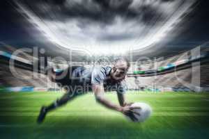 Composite image of sportsman jumping for catching rugby ball
