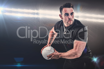 Composite image of rugby player throwing the ball