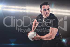 Composite image of rugby player throwing the ball