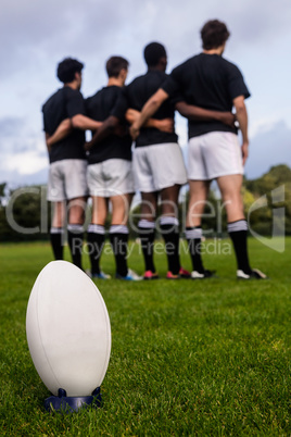 Rugby players standing together before match