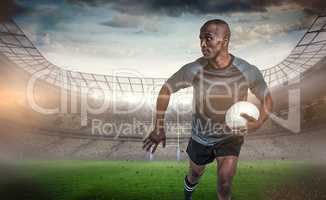 Composite image of sportsman running while holding rugby ball