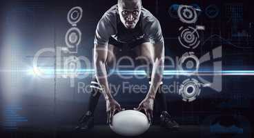 Composite image of sportsman holding ball while playing rugby