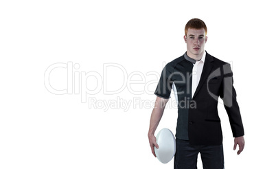 Composite image of rugby player holding a rugby ball