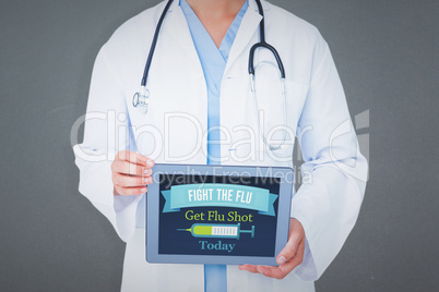 Composite image of doctor showing tablet pc Composite image of doctor showing tablet pc