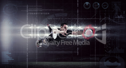 Composite image of rugby player scoring a try