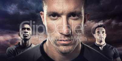 Composite image of close-up portrait of serious rugby player