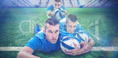 Composite image of rugby player looking away while lying in front with ball