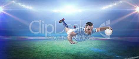 Composite image of rugby player scoring a try