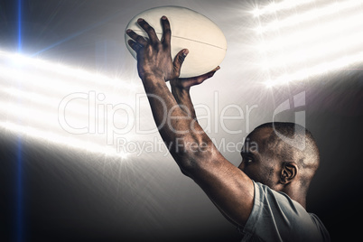 Composite image of athlete throwing rugby ball