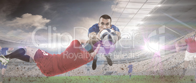 Composite image of a rugby player scoring a try