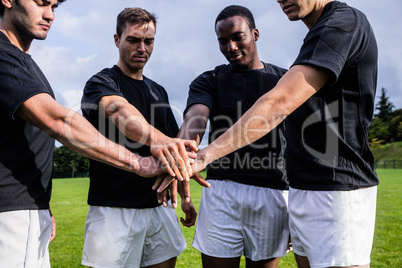 Rugby players standing together before match