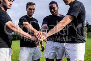 Rugby players standing together before match