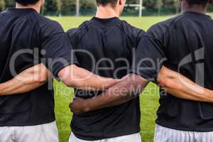 Rugby players standing together before match