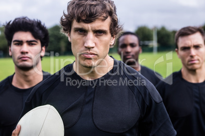 Rugby players standing together before match