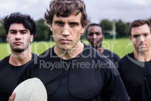 Rugby players standing together before match