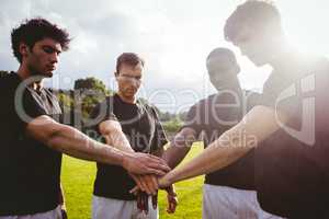 Rugby players standing together before match