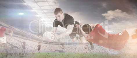 Composite image of a rugby player scoring a try