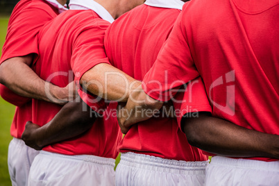 Rugby players standing together before match