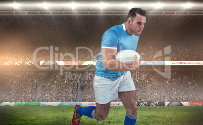 Composite image of rugby player running with the ball