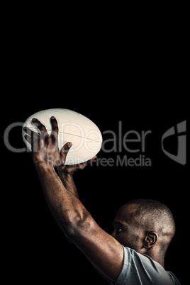 Composite image of athlete throwing rugby ball