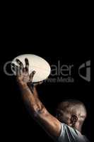 Composite image of athlete throwing rugby ball