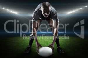 Composite image of portrait of sportsman holding ball while play