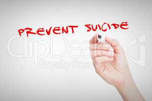 Prevent suicide against female hand holding black whiteboard mar