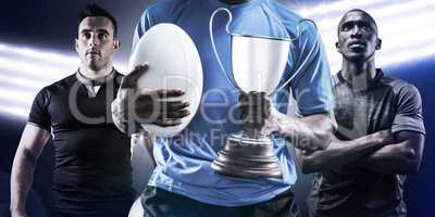 Composite image of mid section of sportsman holding trophy and r