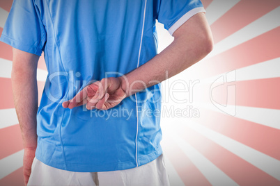 Composite image of rugby player with hands on hips