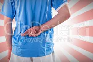 Composite image of rugby player with hands on hips