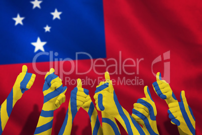 Composite image of group of hands giving thumbs up