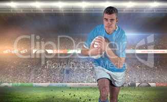 Composite image of rugby player running with the rugby ball