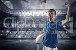 Composite image of confident rugby player flexing muscles
