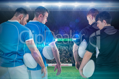 Composite image of tough rugby players